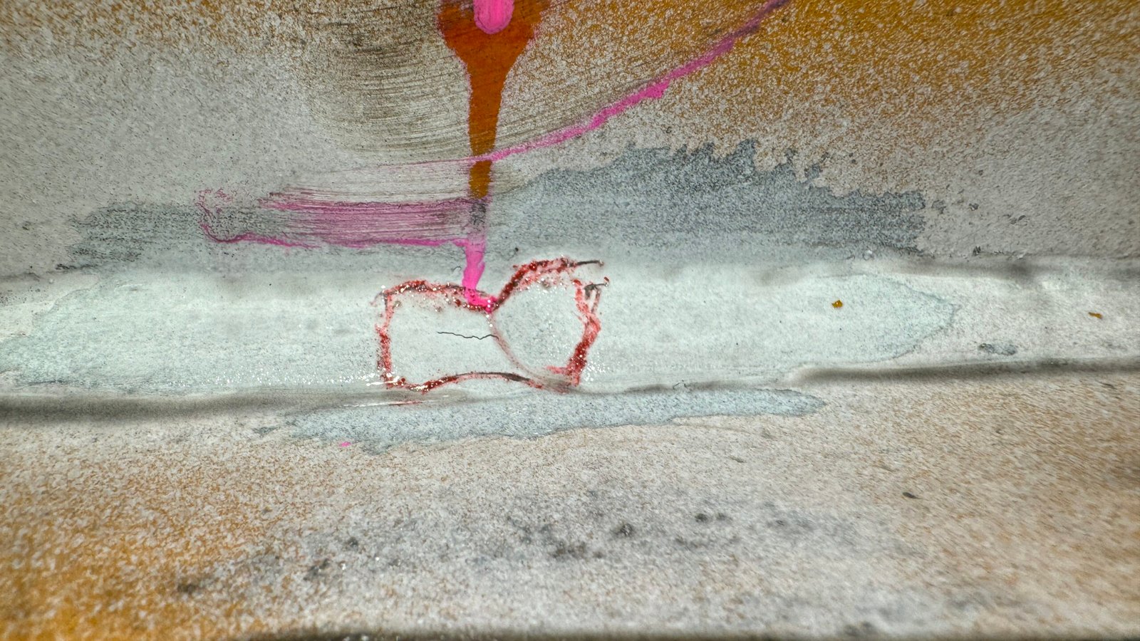 Magnetic Particle Inspection highlighting surface cracks on crane weld for compliance and certification