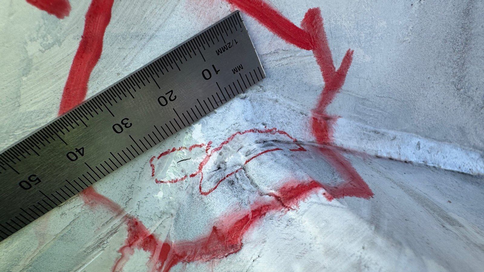 Technicians performing Magnetic Particle Inspection on truck crane boom during 10 Yearly Boom Inspection